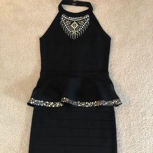 Bebe black peplum mini dress size M